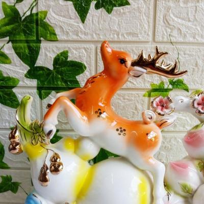 TƯỢNG HƯƠU VÀ HỒ LÔ VÀNG